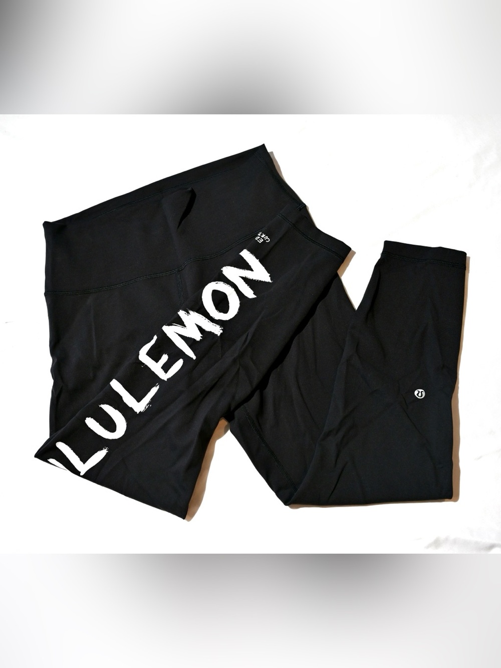 Lululemon Wunder Train High-Rise Tight 25” Black Logo Graphic Leggings Size 12